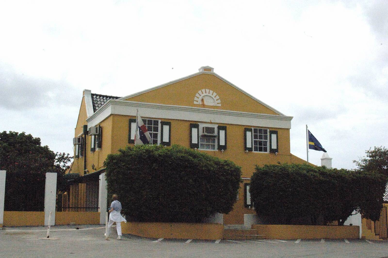 The ochre facade of Landhuis Chobolobo, the Willemstad estate where genuine Curaçao liqueur is distilled