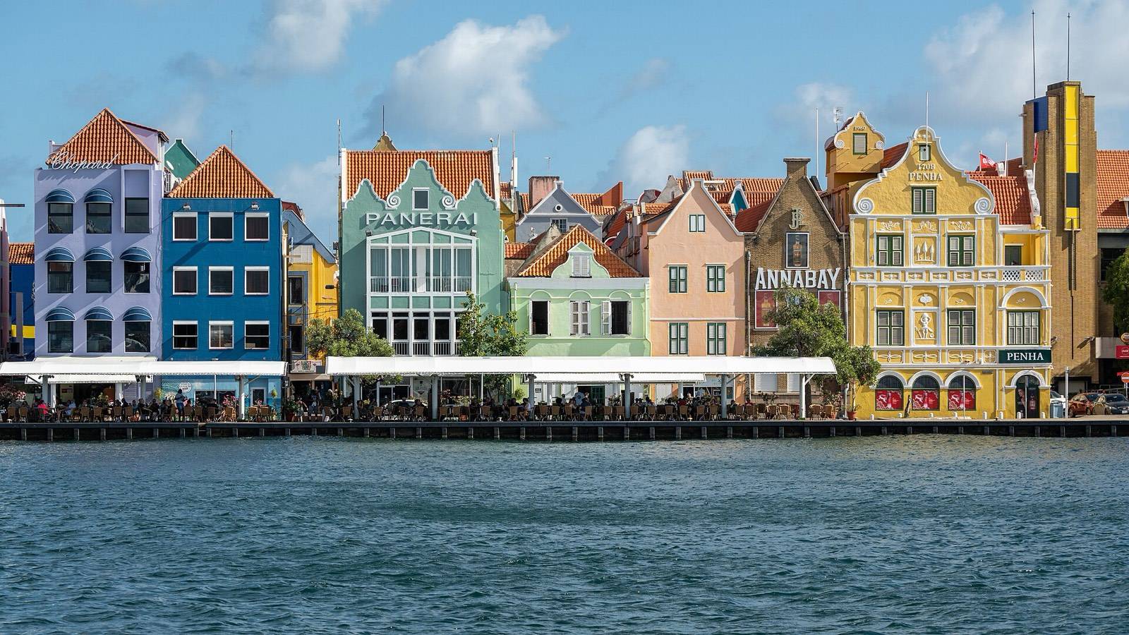 The colorful waterfront merchant facades of the Handelskade in Punda, Willemstad, Curaçao