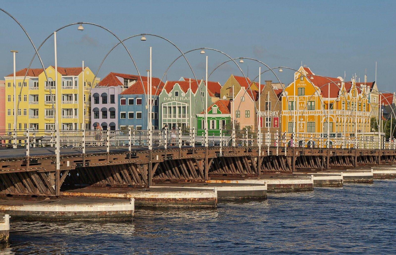 The Queen Emma pontoon bridge stretching across the harbor entrance in Willemstad