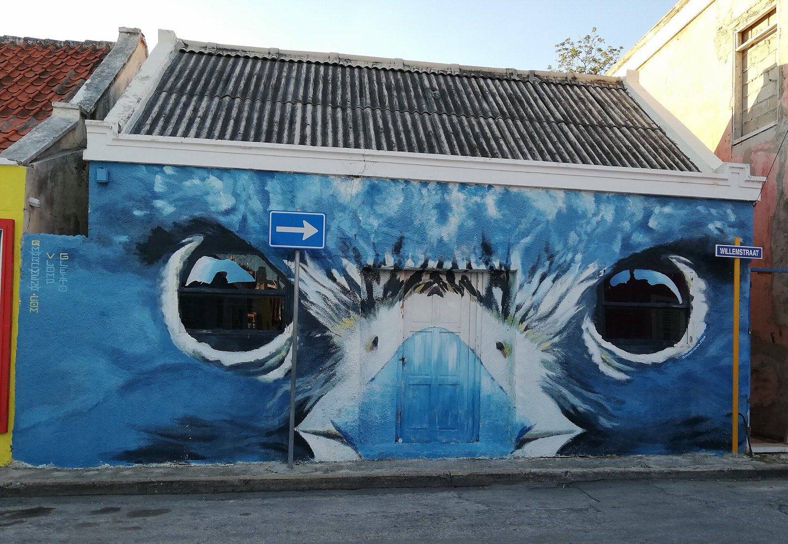 A large portrait mural by Garick Marchena on a wall in Otrobanda, Willemstad